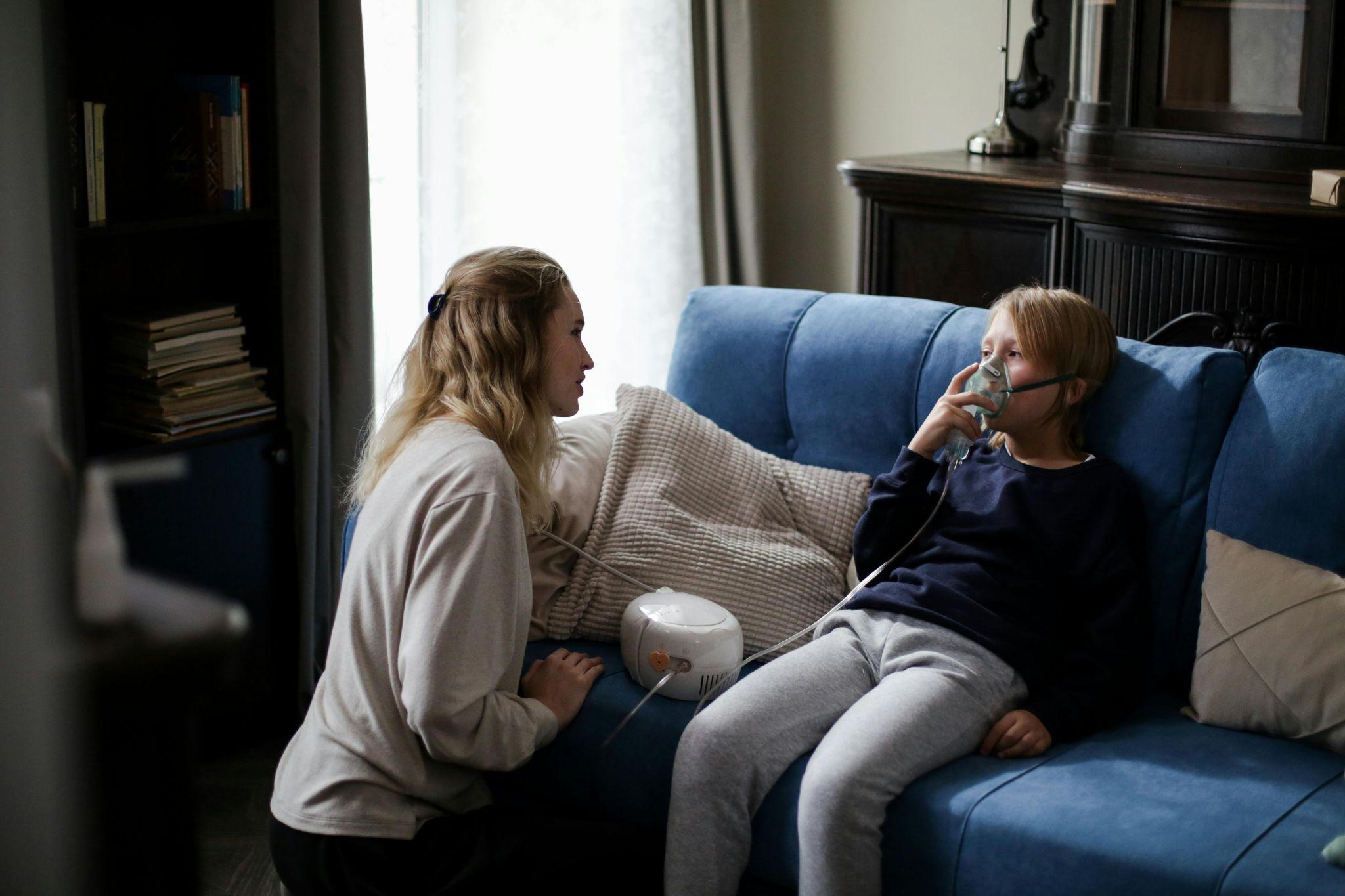 Child using nebulizer with care, supported by trusted Harlingen DME company equipment for safe, reliable respiratory therapy at home.
