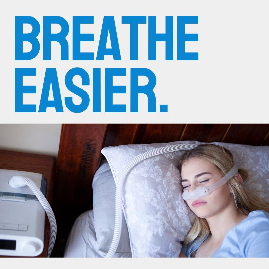 woman using CPAP machine