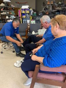 person getting fitted for custom orthotics after discovering Where to Get Custom Orthotics in the RGV