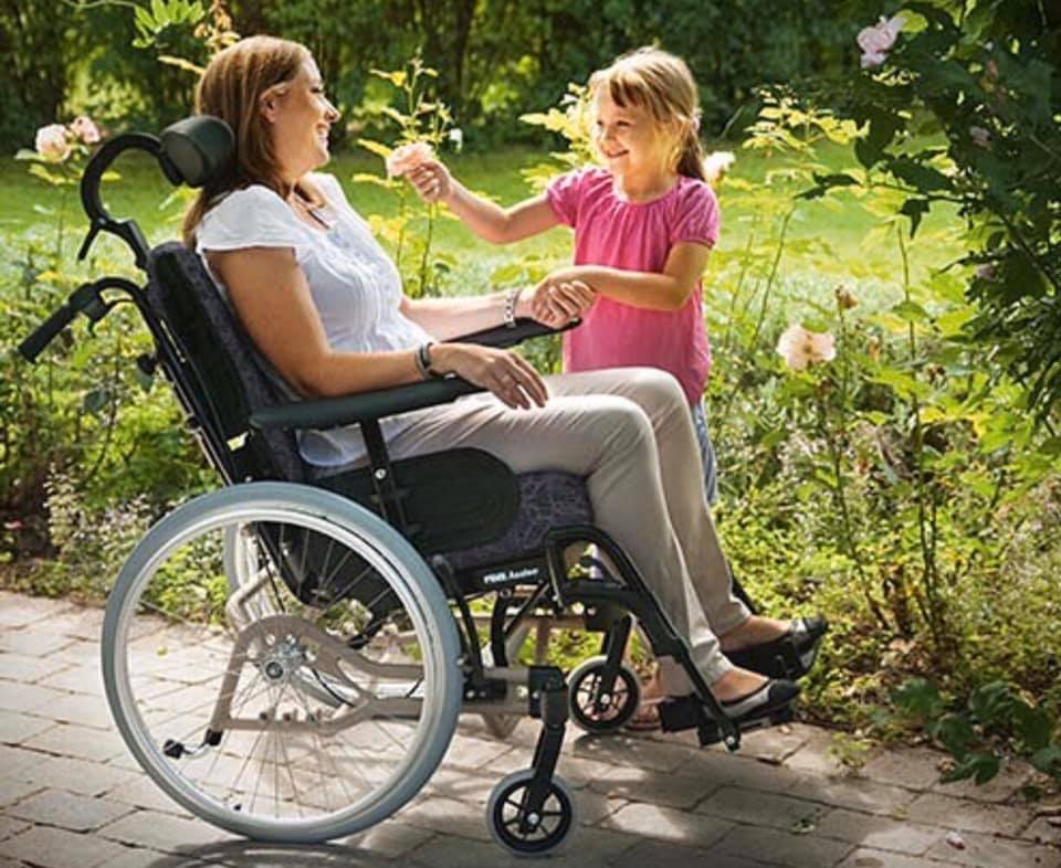 woman in wheelchair and companion
