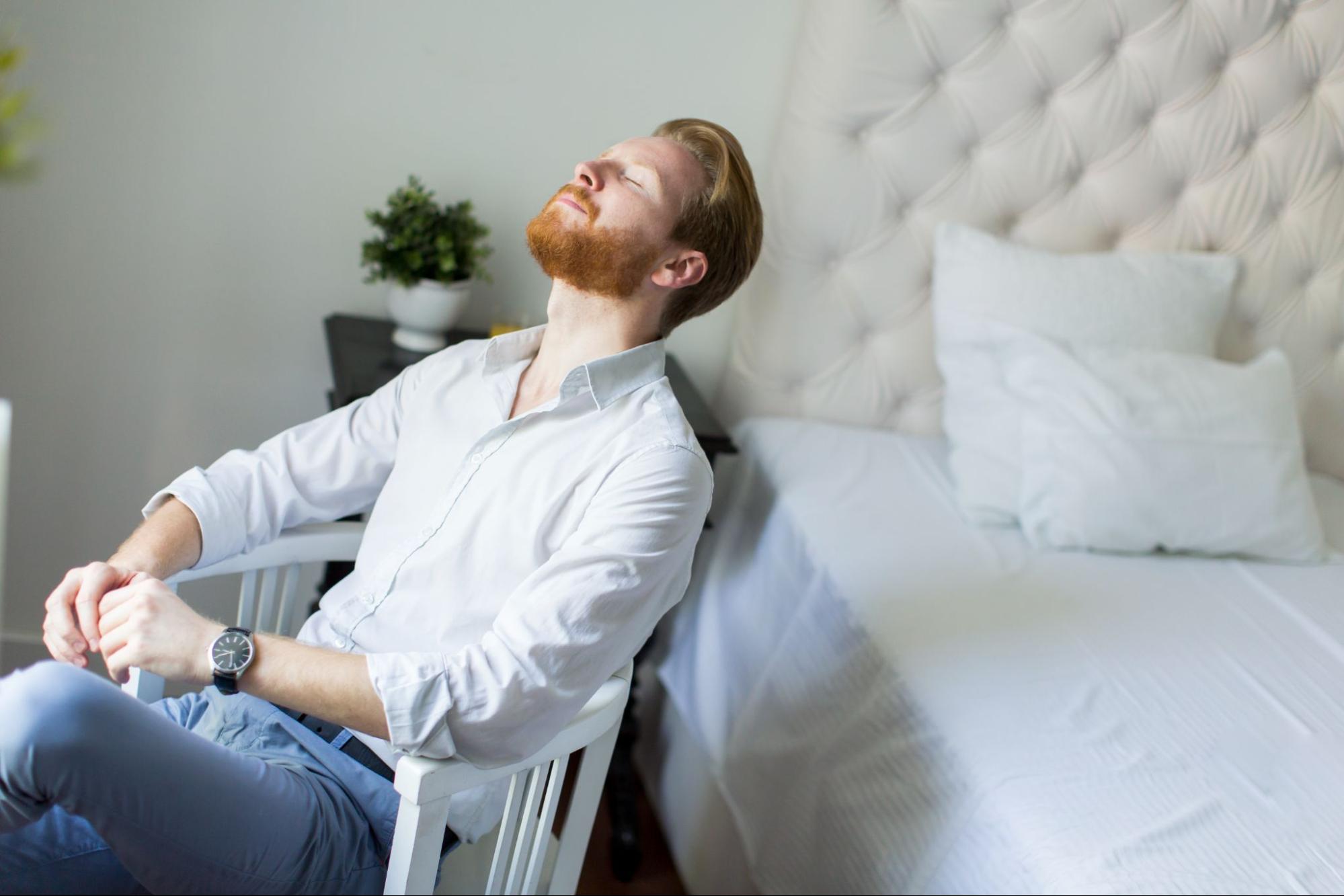 Man breathing comfortably after a good night’s sleep.