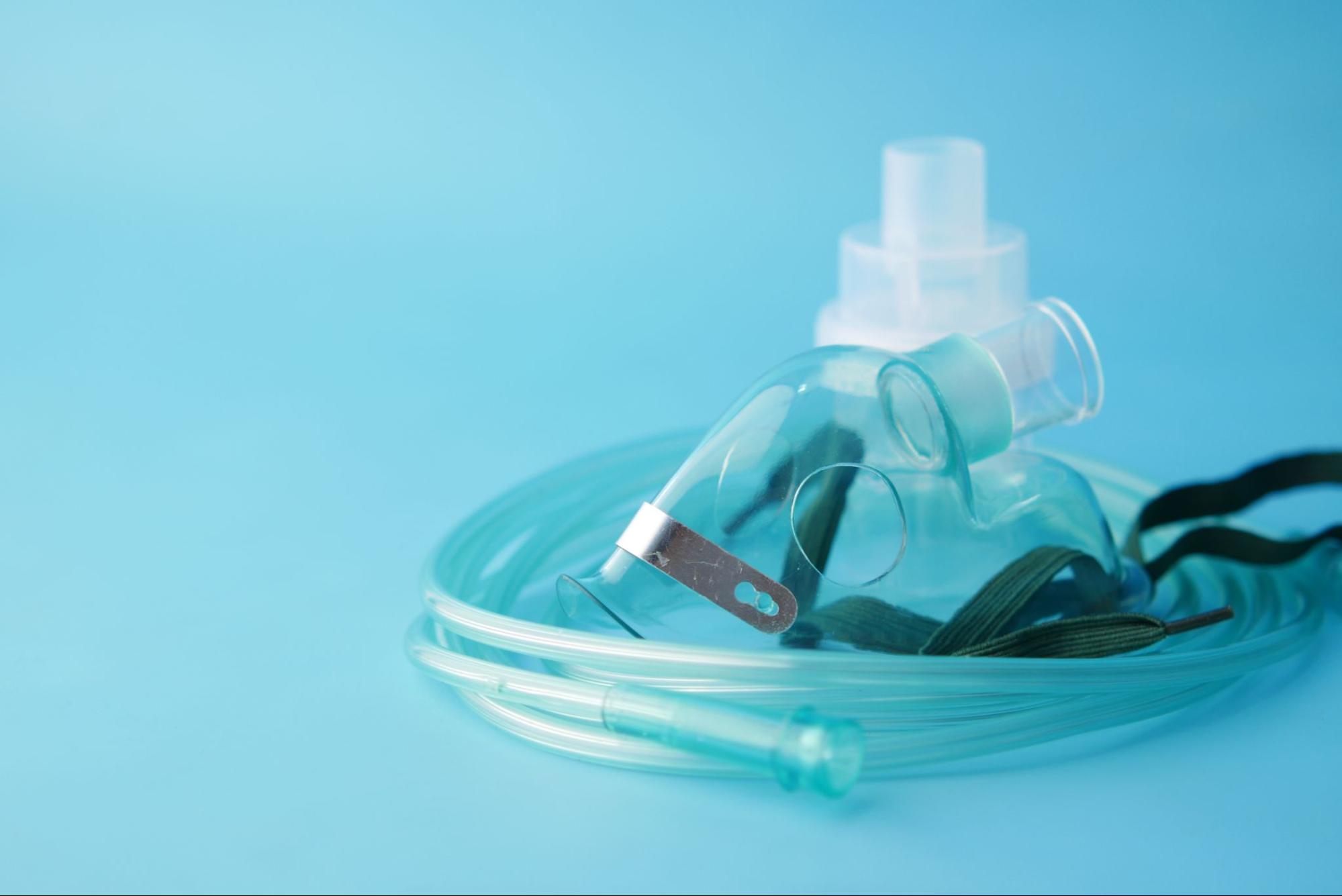 nebulizer on blue surface
