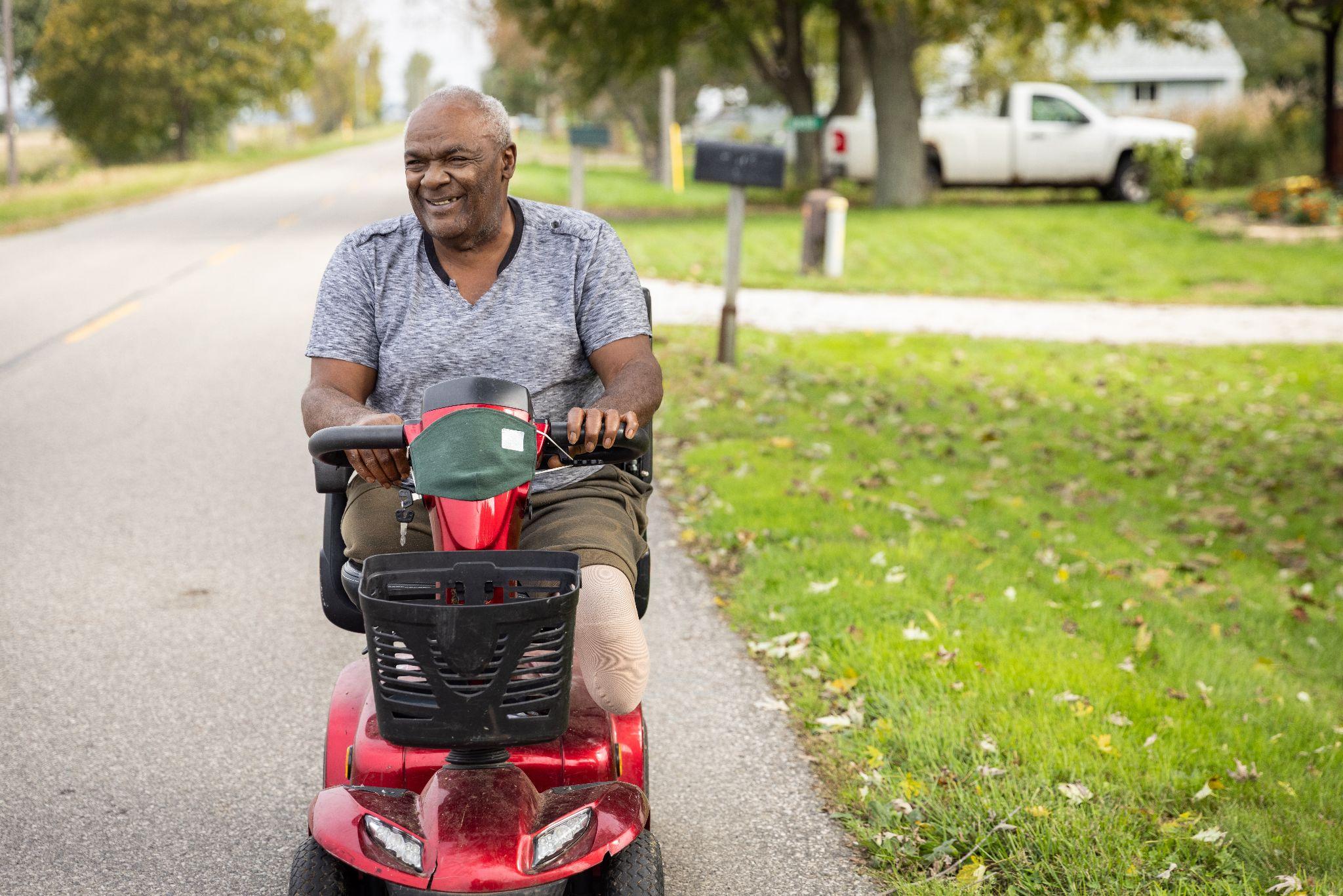 man using mobility scooter