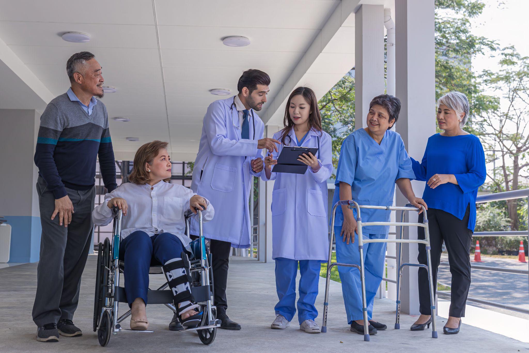 people in a hospital, using durable medical equipment
