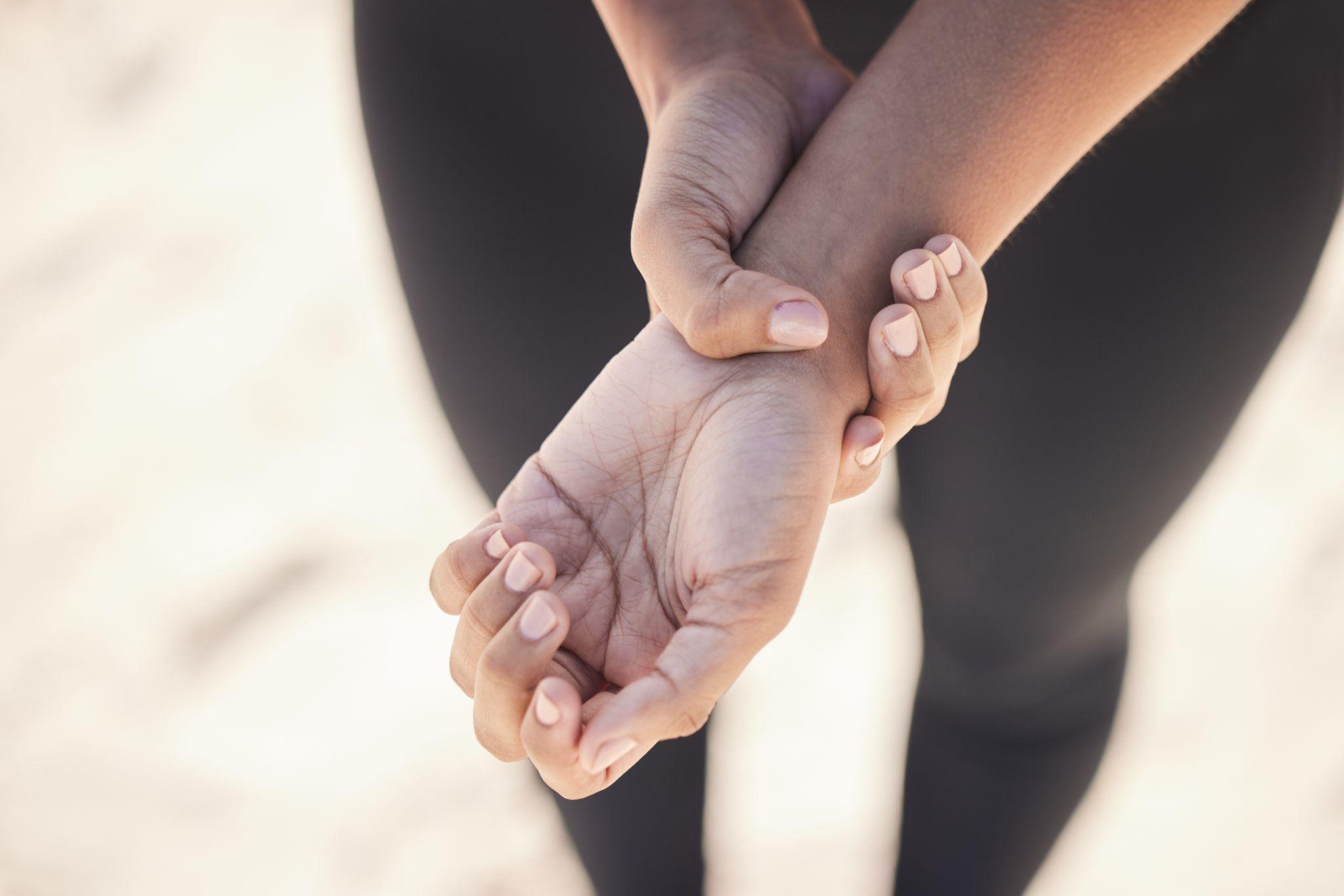person holding wrist