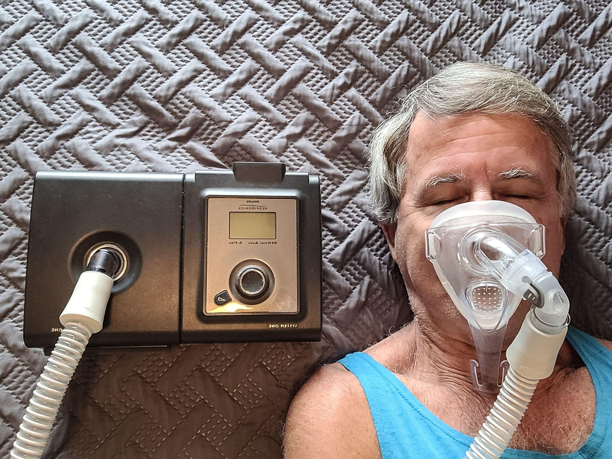 man using CPAP machine