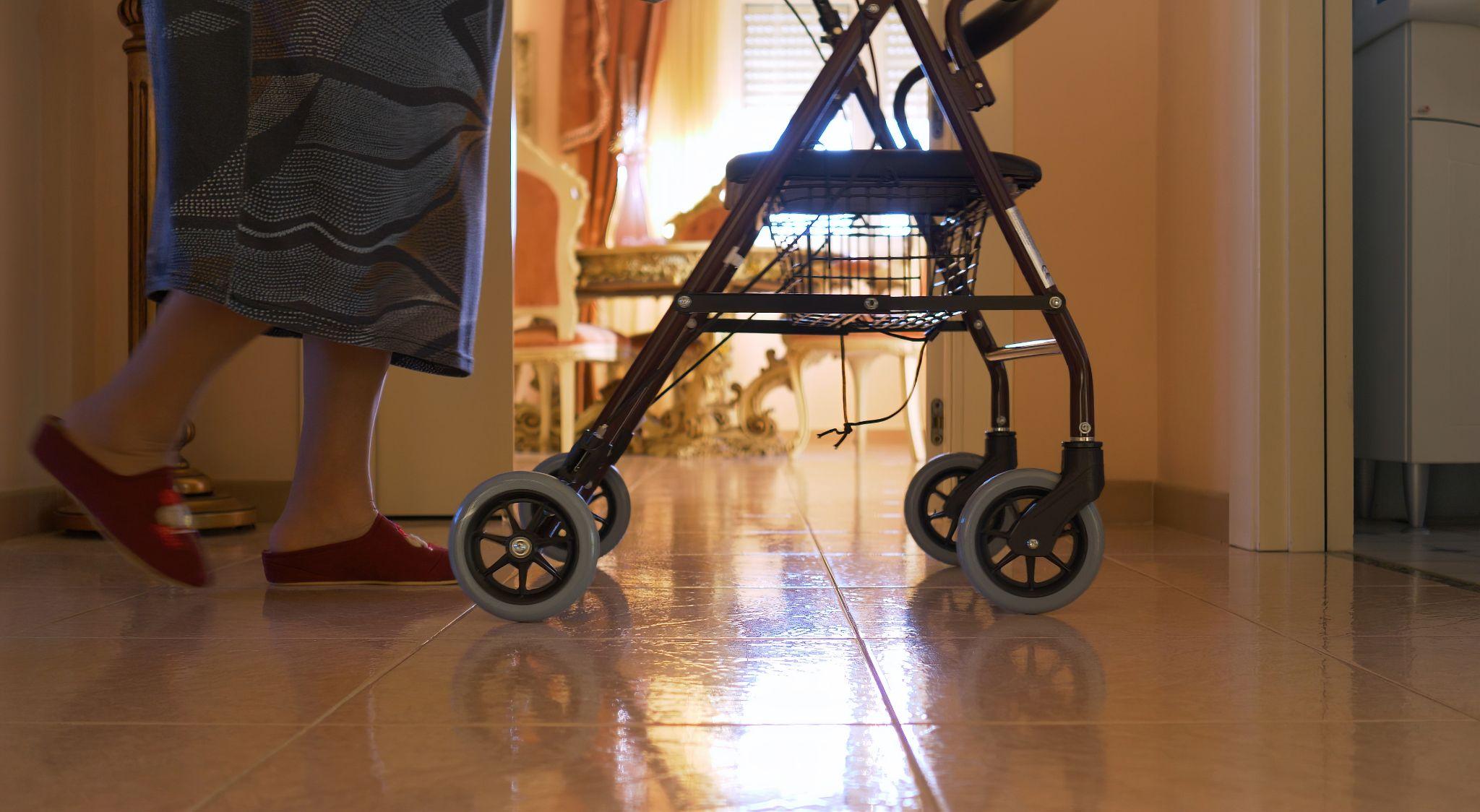 woman using rollator at home, representing medical supplies and equipment for home use in the Rio Grande Valley