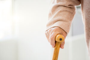 person using cane, representing durable medical equipment suppliers near me