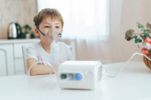 child using nebulizer, representing nebulizers in harlingen, tx