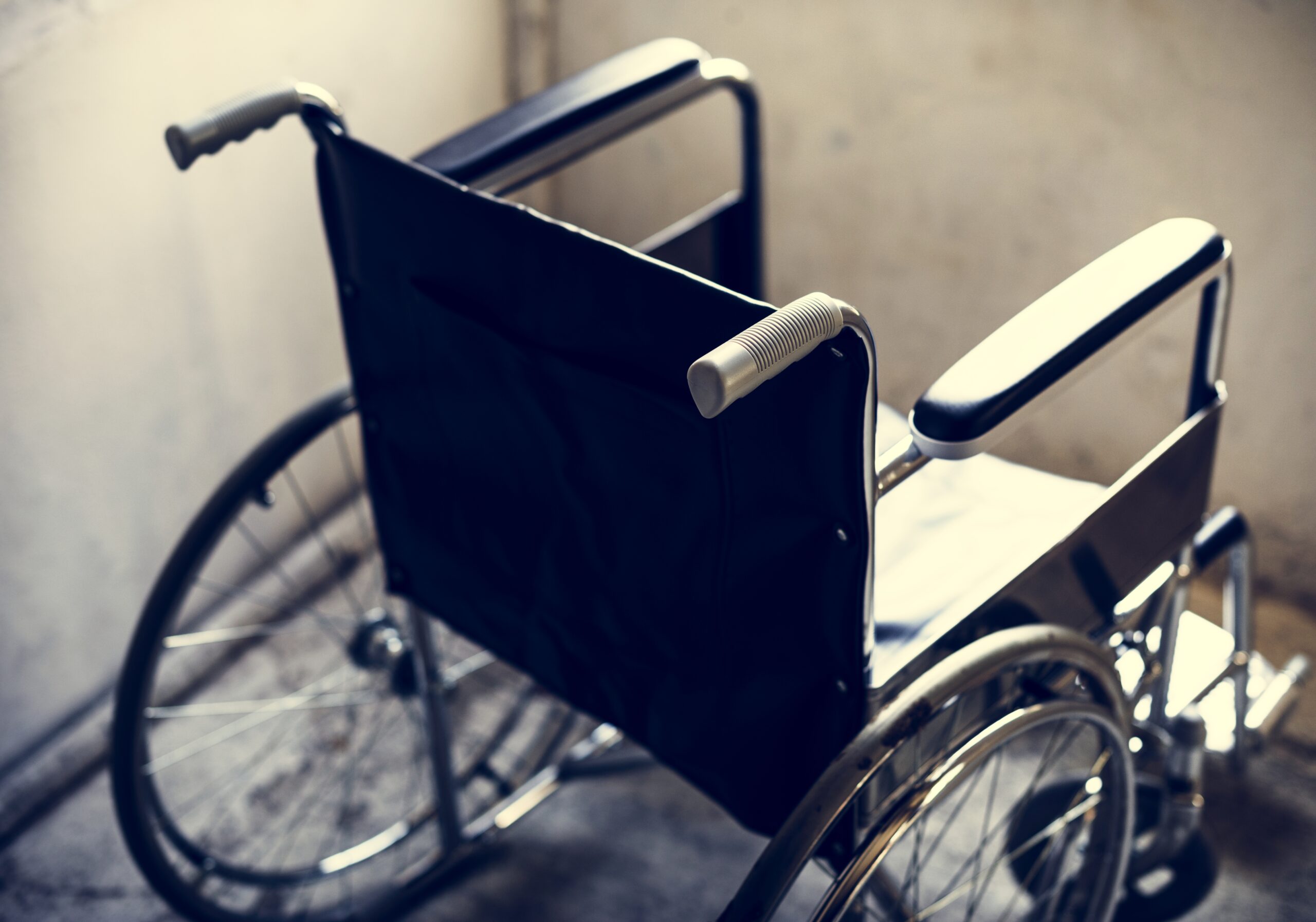 Empty wheelchair in a room