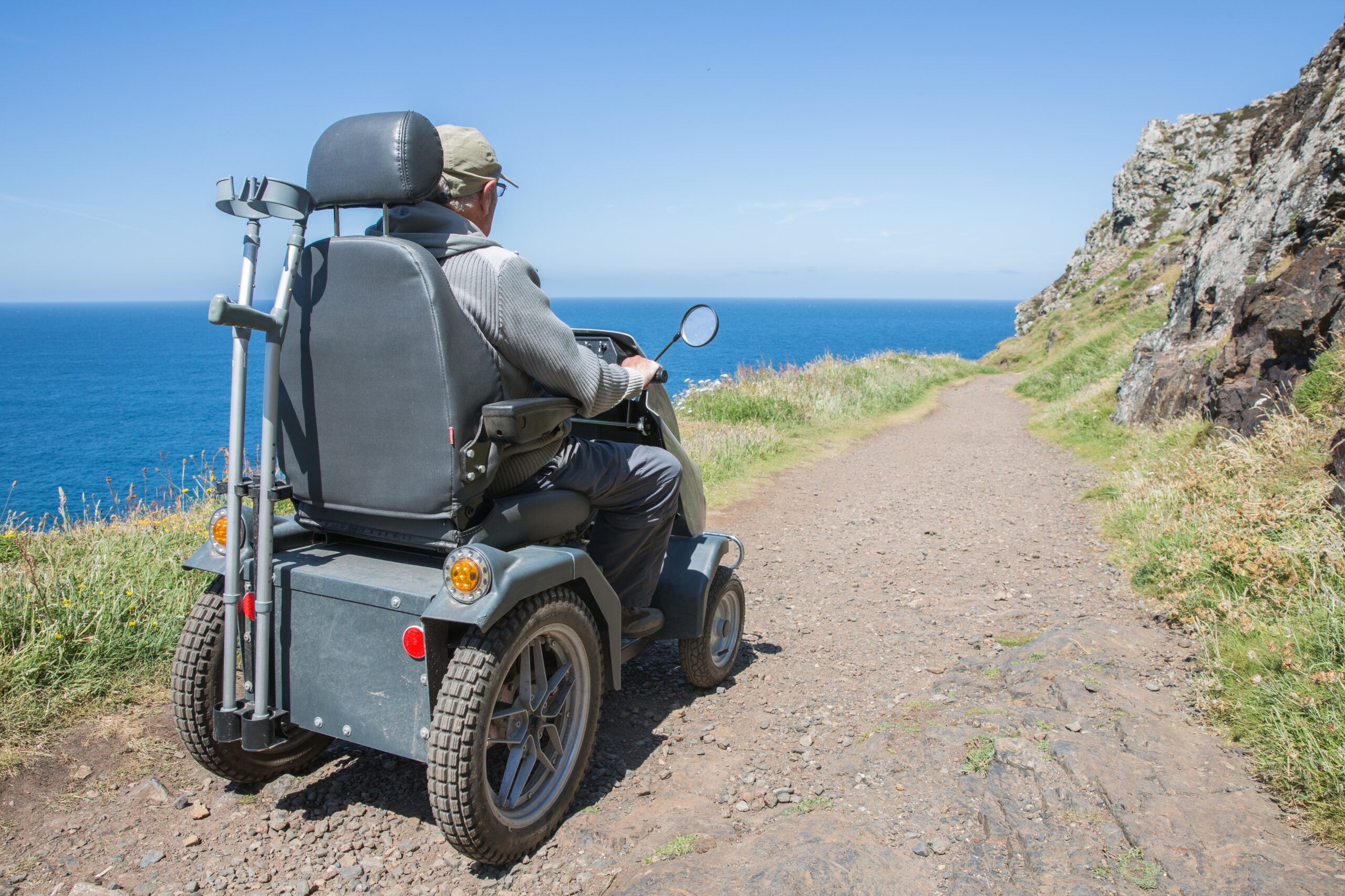 man in mobility scooter
