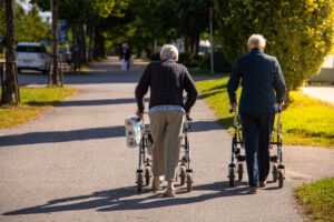 two senior people using rollators, representing the need for Equipment Maintenance for Medical Supplies