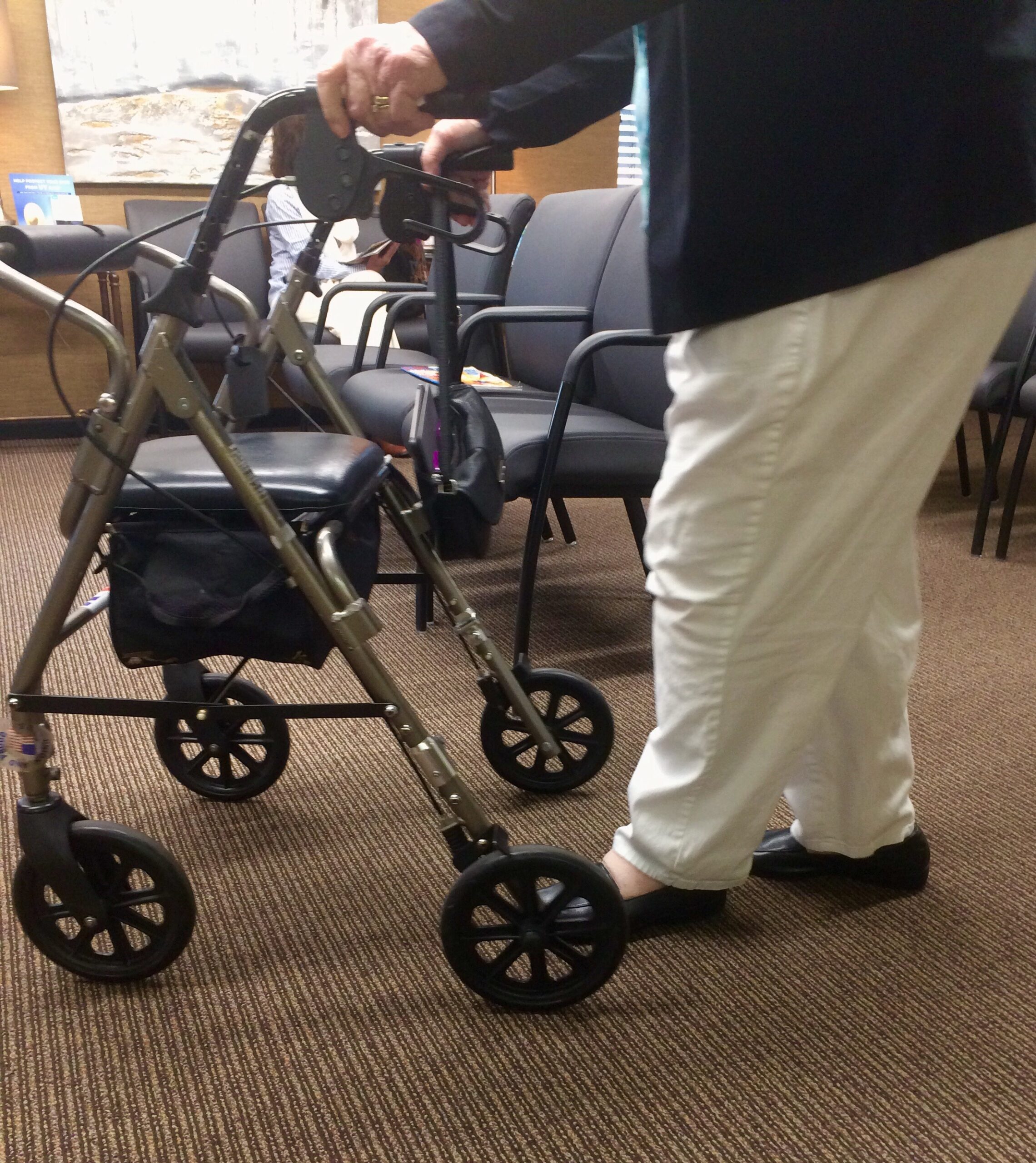 senior using walker for mobility