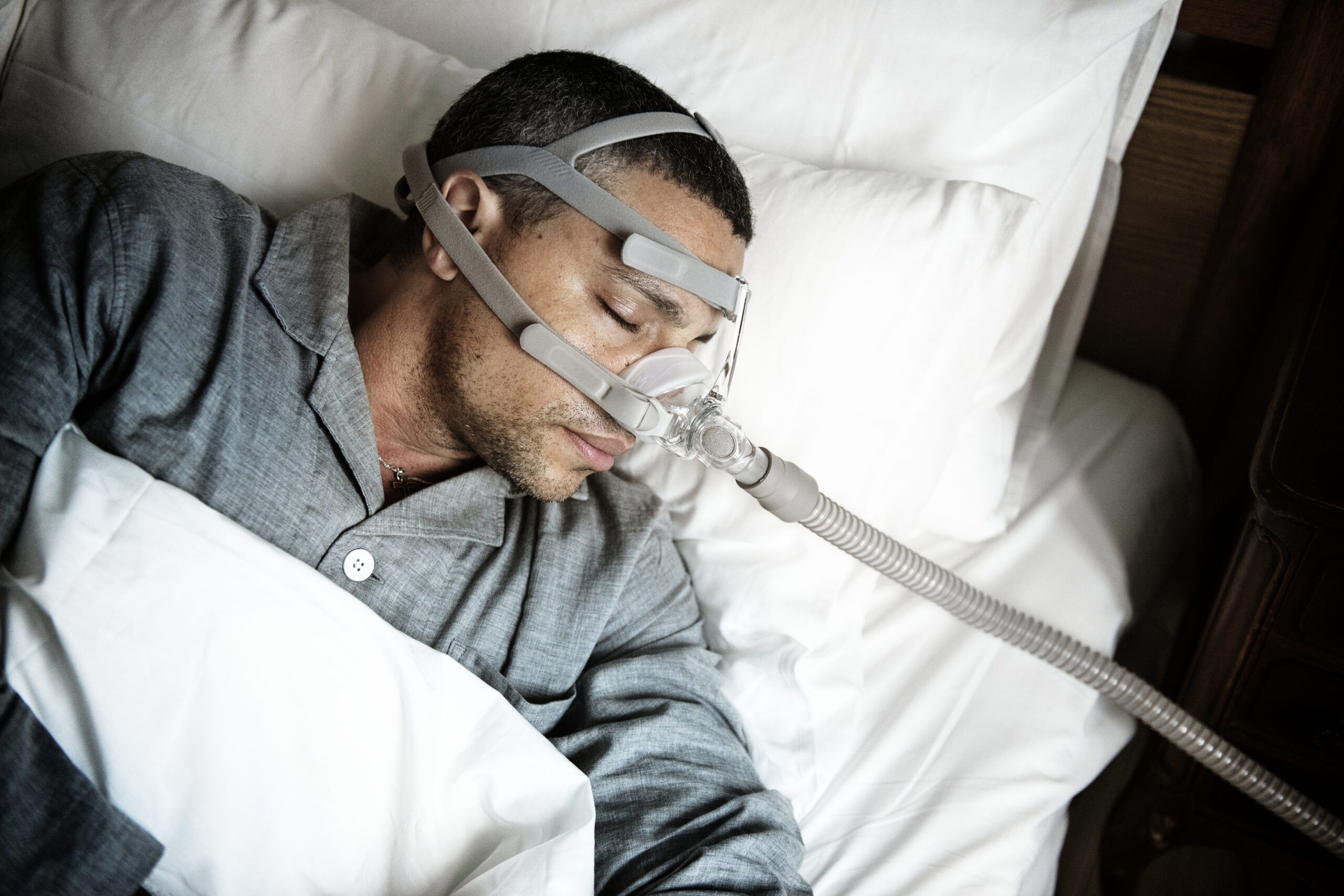 man using CPAP machine