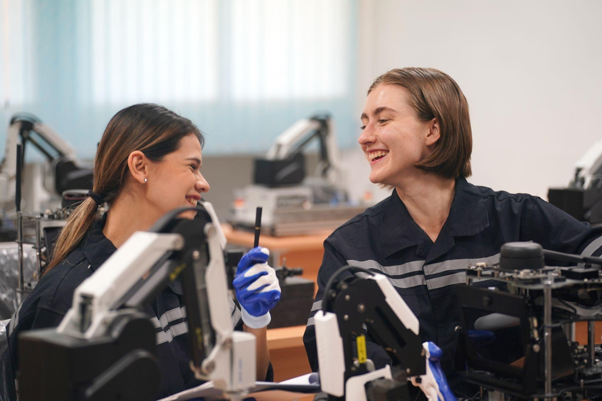 Technicians working together on mobility equipment used for complex rehab solutions and personalized support.