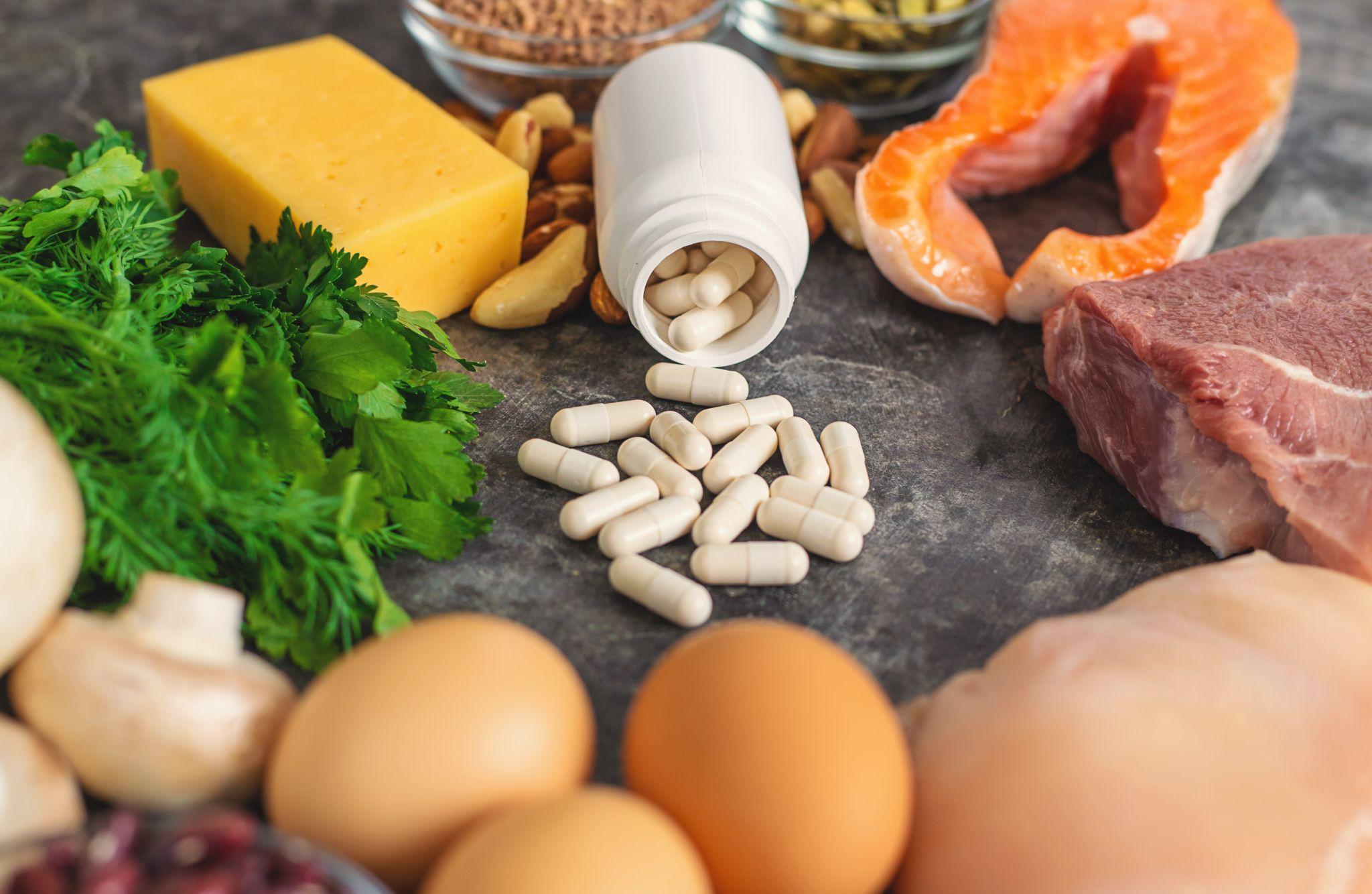 Protein-rich foods and dietary supplement capsules displayed as nutrition options for joint support.
